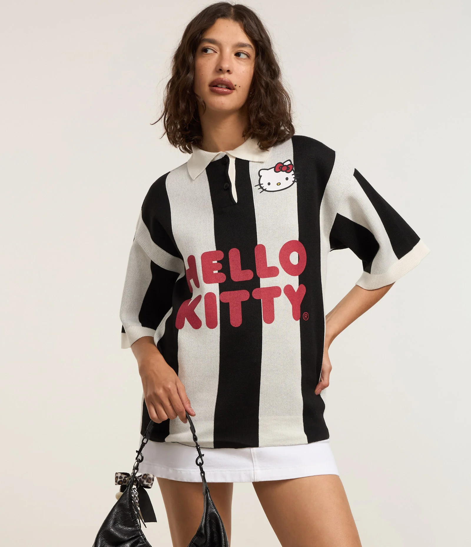 Camiseta em Tricô com Listras e Lettering Hello Kitty Branco/Preto 1