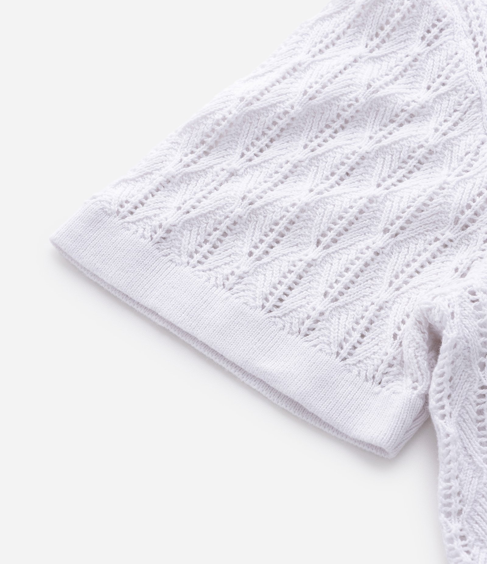 Polo Manga Curta em Tricô Texturizado com Losango Branco 5