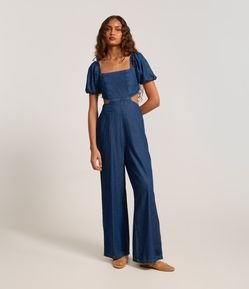 Macacão Jeans com Manga Bufante e Vazado na Cintura