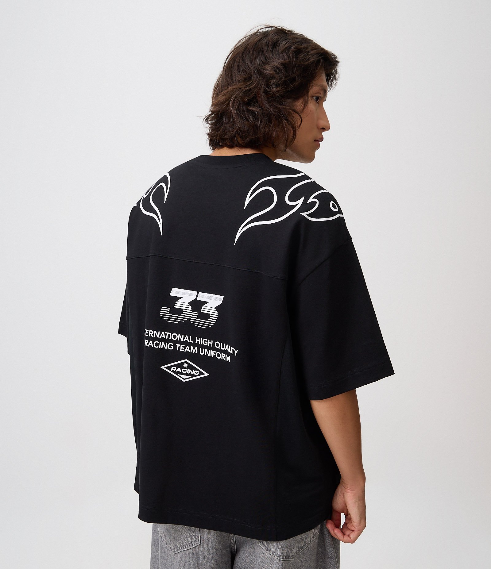 Camiseta Oversized em Malhão com Estampa Lettering e Tribal de Chamas Preto 3