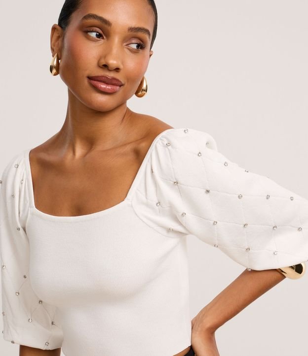 Blusa em Tricô com Brilho e Textura na Manga Bufamte
