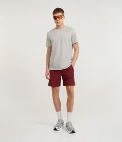 Bermuda Esportiva com Laser Cut e Bolsos com Zíper