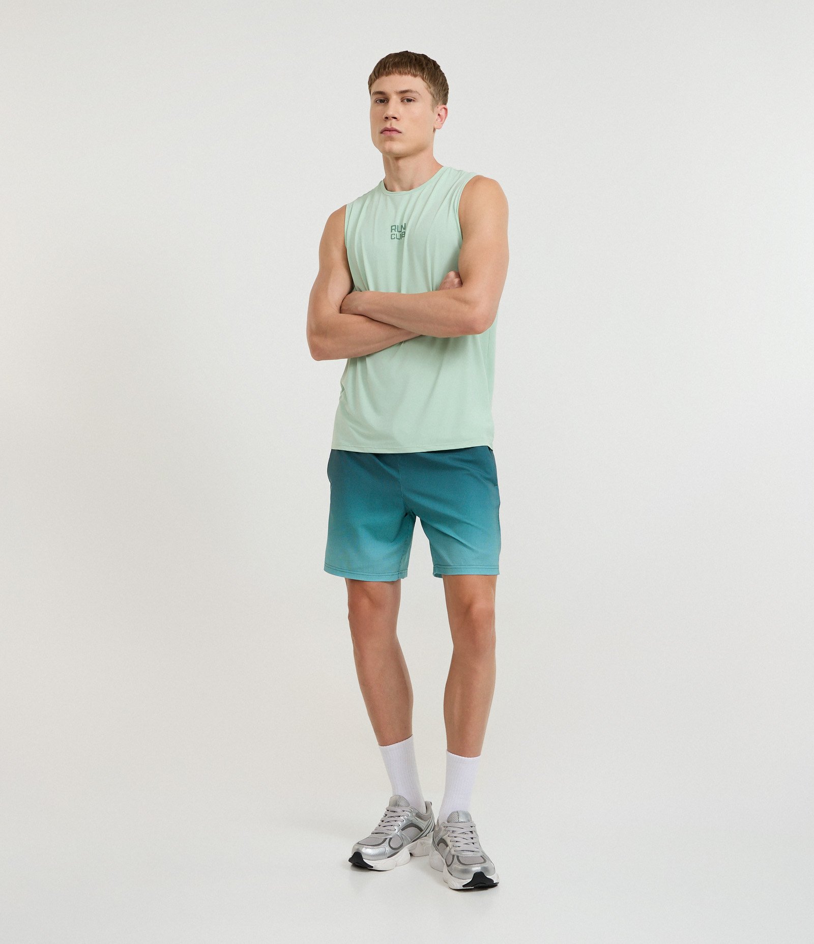 Bermuda Esportiva com Xadrez e Degrade na Barra Verde 1