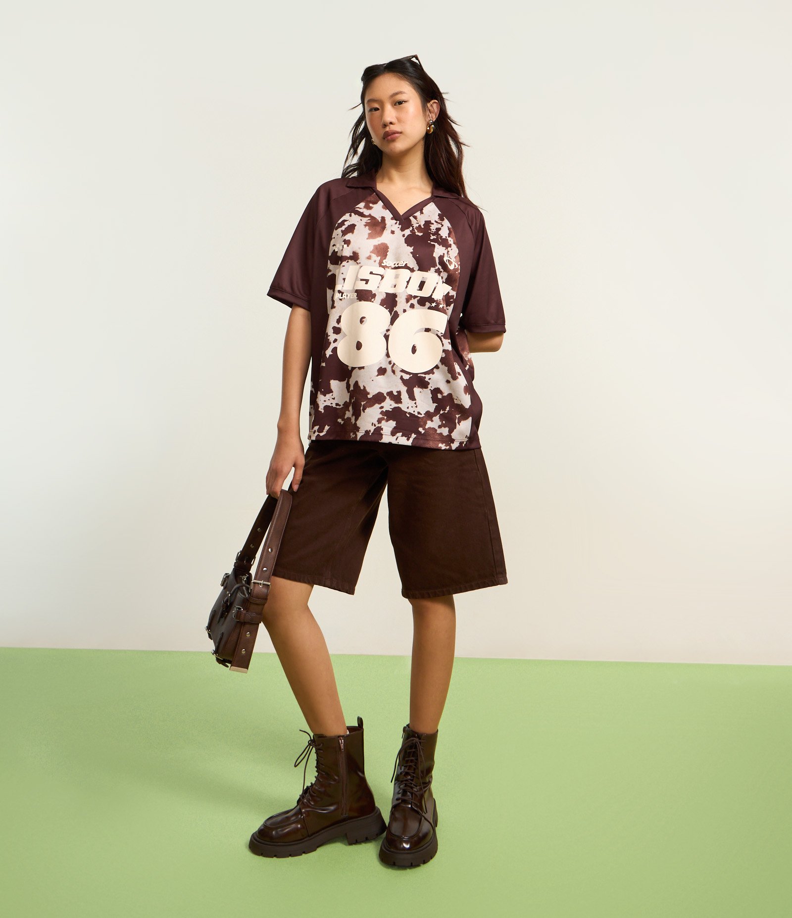 Camiseta Over com Cava Raglan e Fundo Animal Print Marrom 6