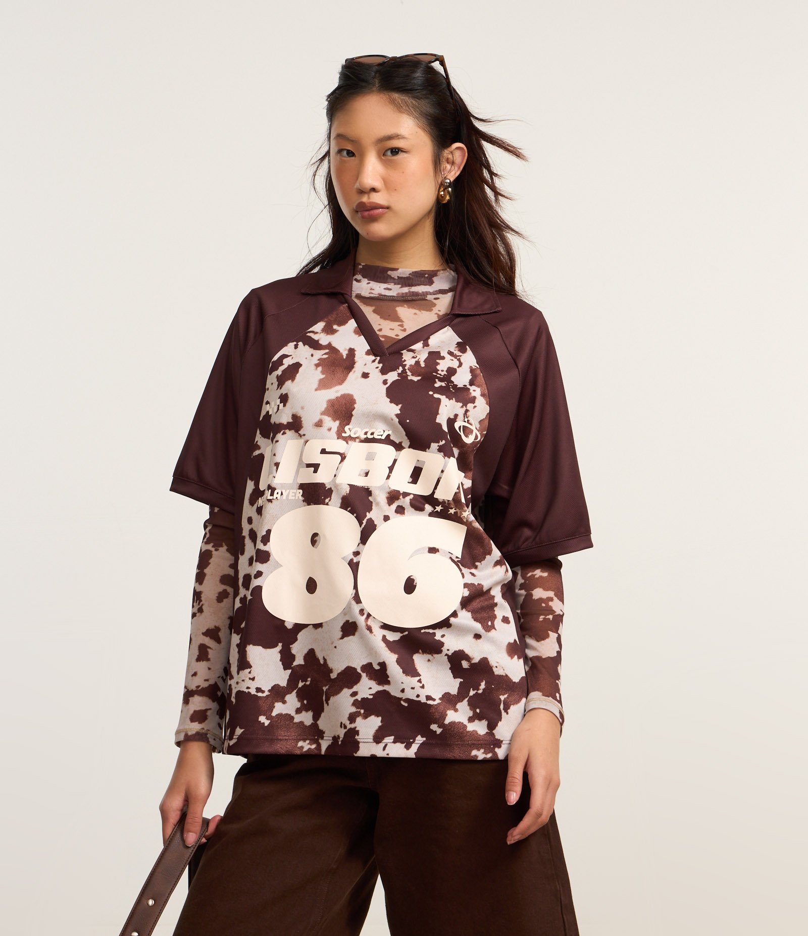 Camiseta Over com Cava Raglan e Fundo Animal Print Marrom 1