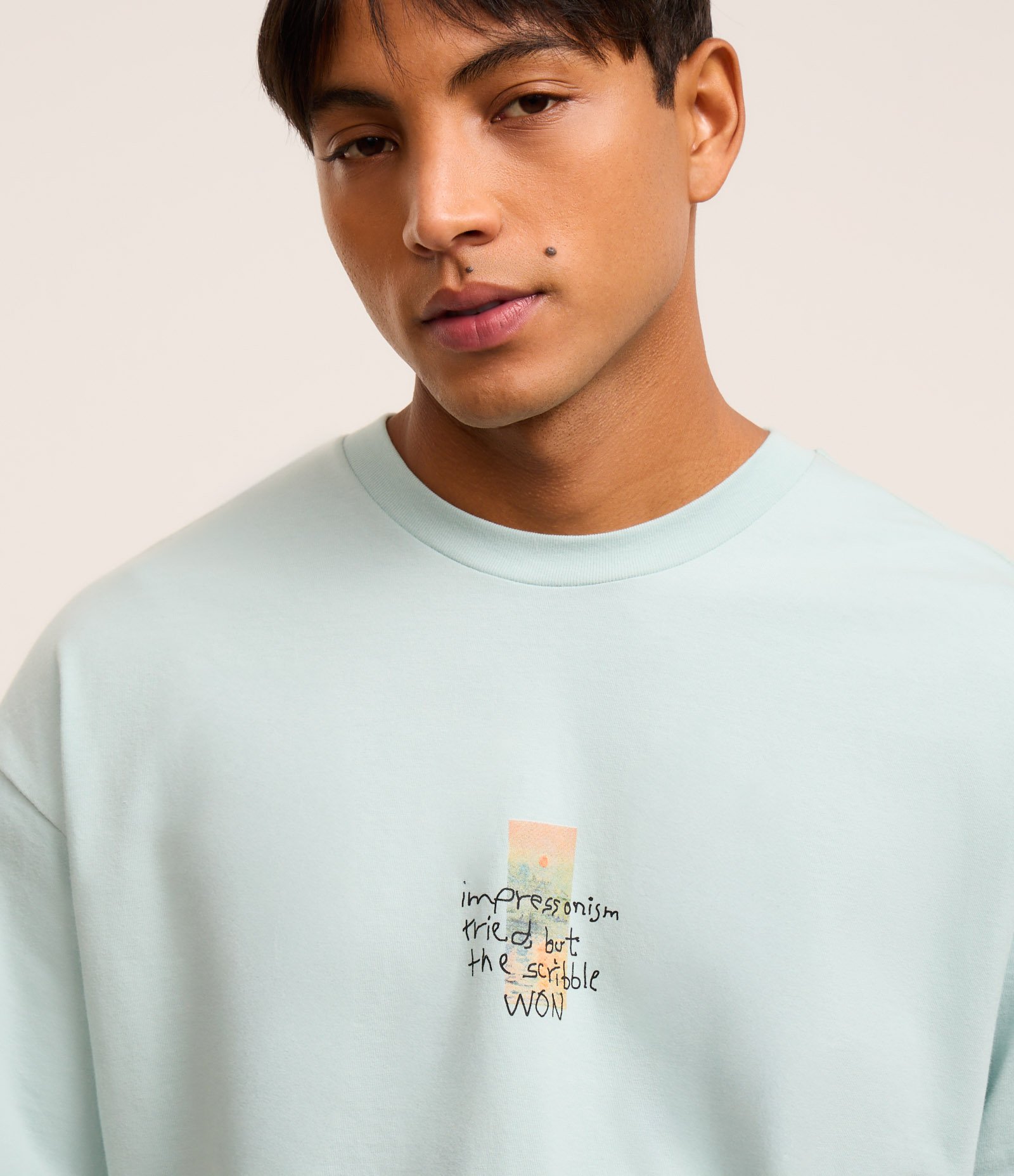 Camiseta Oversized em Malhão com Estampa Lettering Artística Verde 4