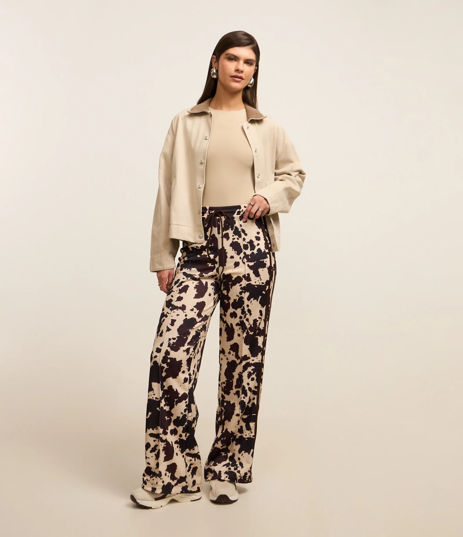 Calça Esportiva em Helanca com Estampa Animal Print Off White/Preto 1