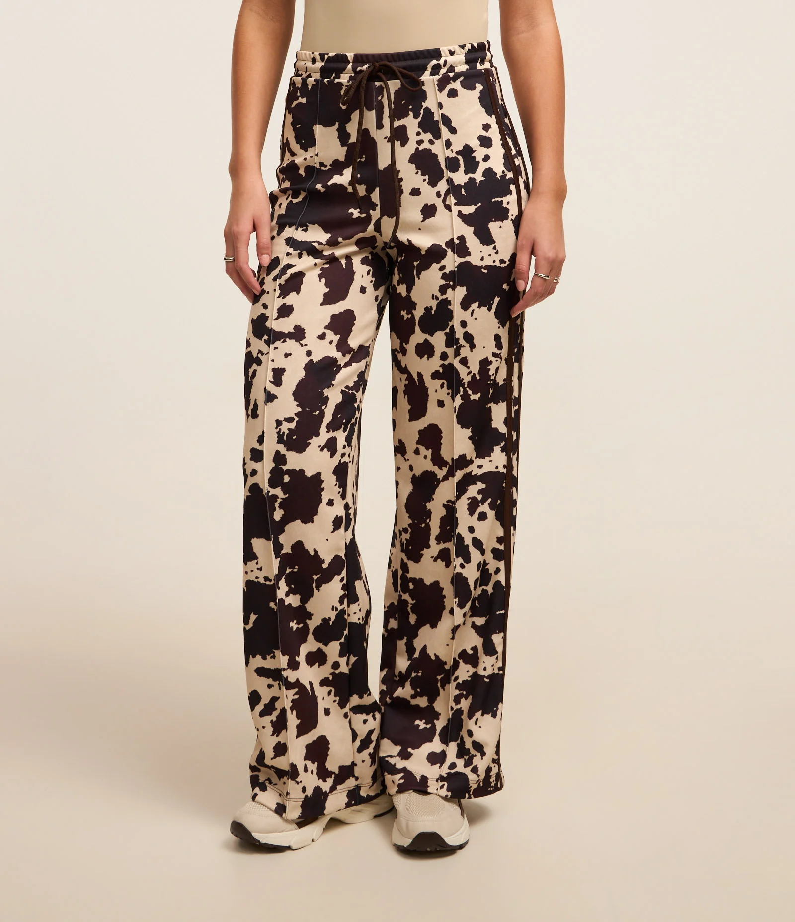 Calça Esportiva em Helanca com Estampa Animal Print Off White/Preto 2