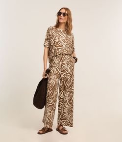 Calça Reta em Piquet com Elástico no Cós e Estampa Abstrata