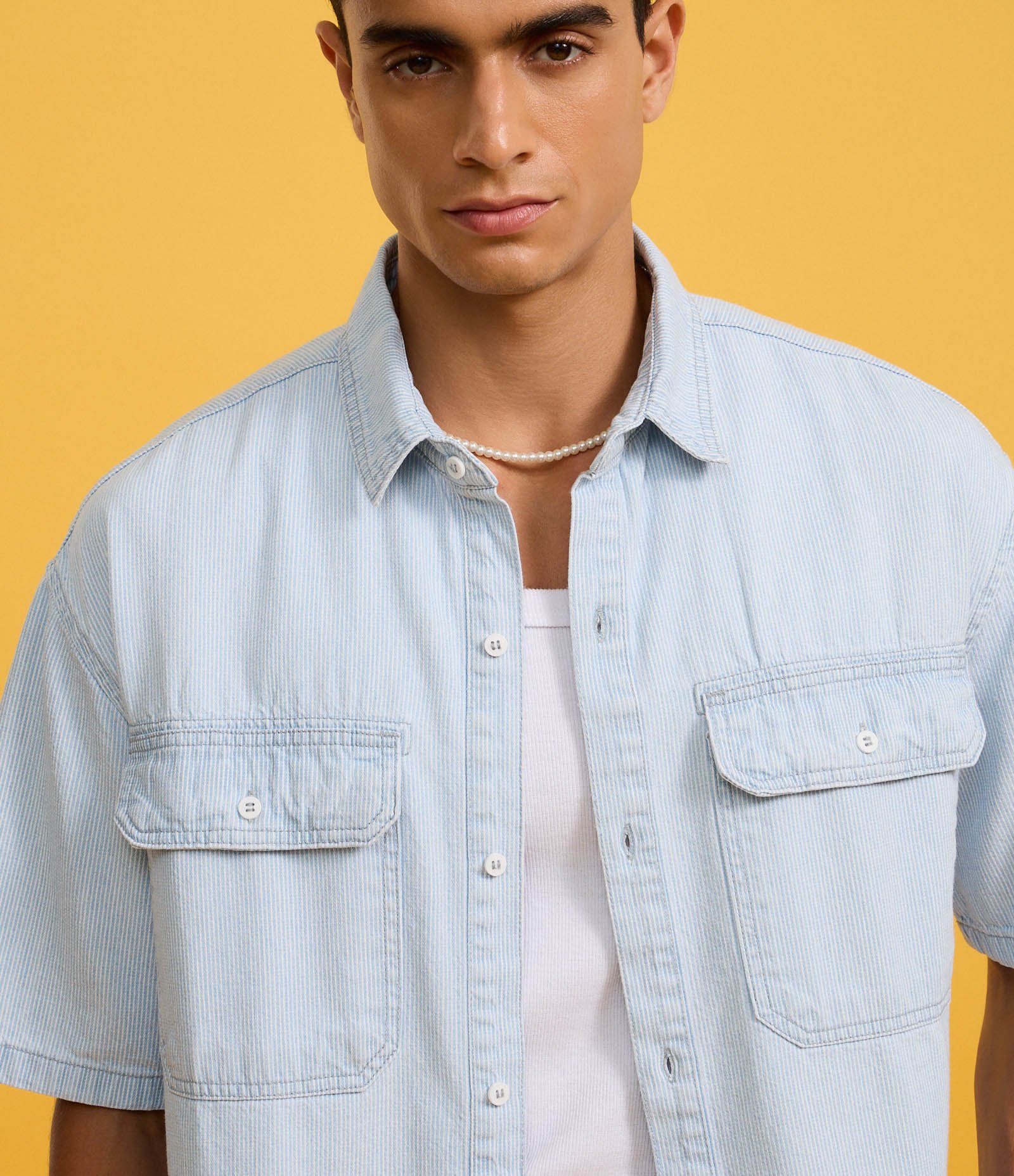 Camisa Boxy em Jeans com Estampa de Listras e Bolsos Azul 4