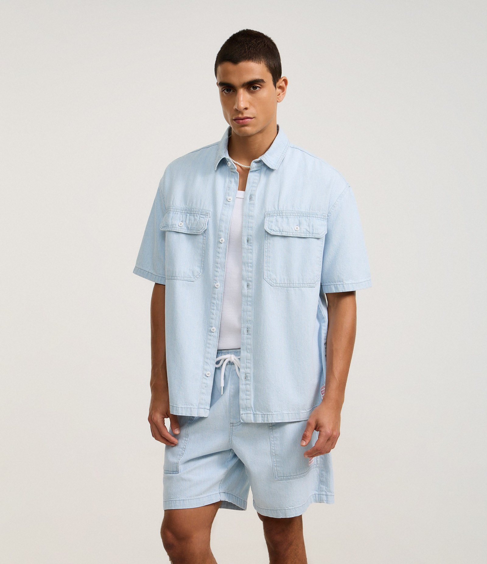 Bermuda Regular em Jeans com Cós Elástico e Estampa Listrada Azul 6