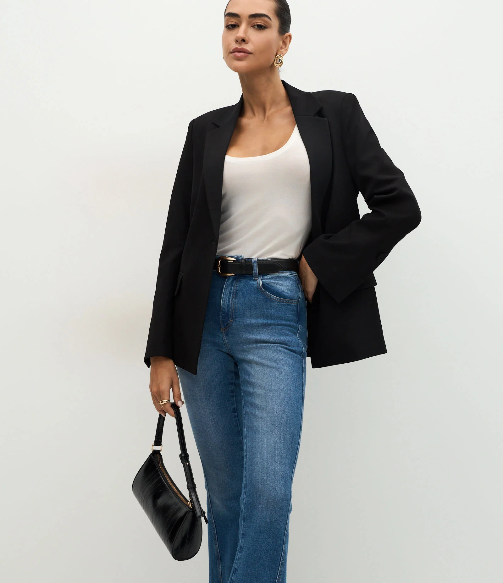 Calça Flare Cintura Alta em Jeans com Lateral Transpassada Médio 2