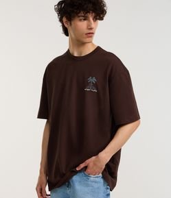 Camiseta Relaxed em Algodão com Estampa de Coqueiro e Lettering Work Hard