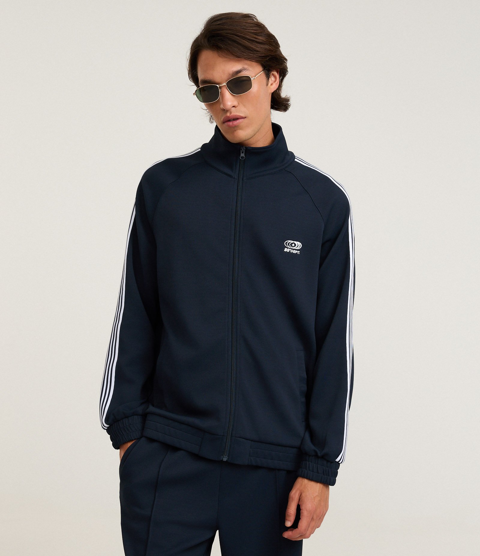 Casaco em Helanca com Bordado Localizado e Listras Contrastantes Preto 1