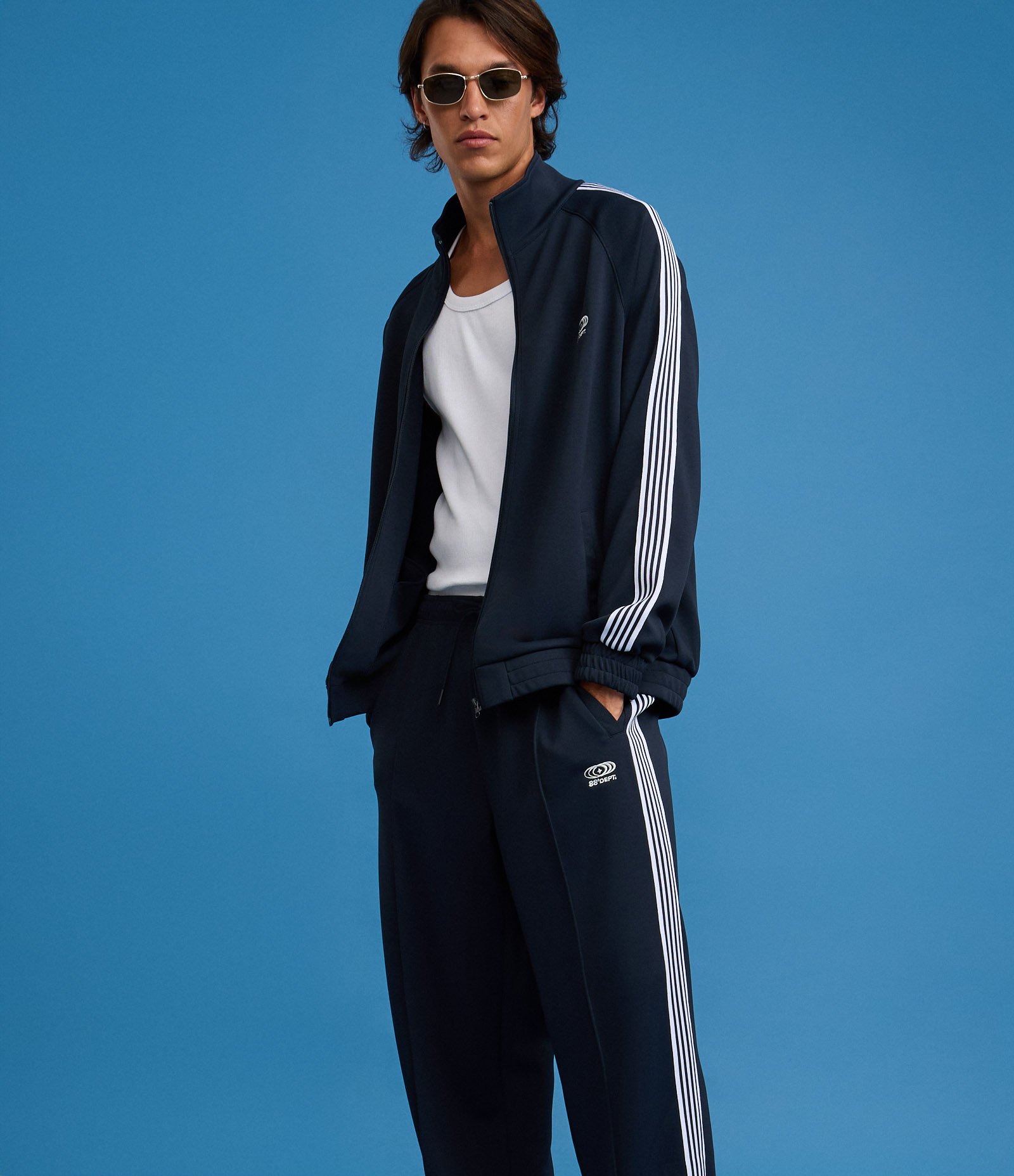 Calça Esportiva em Helanca com Listras Laterais e Estampa Localizada Azul Escuro 5