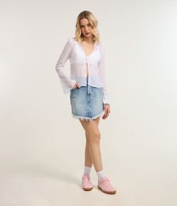 Saia Curta Jeans com Barra Desfiada Irregular