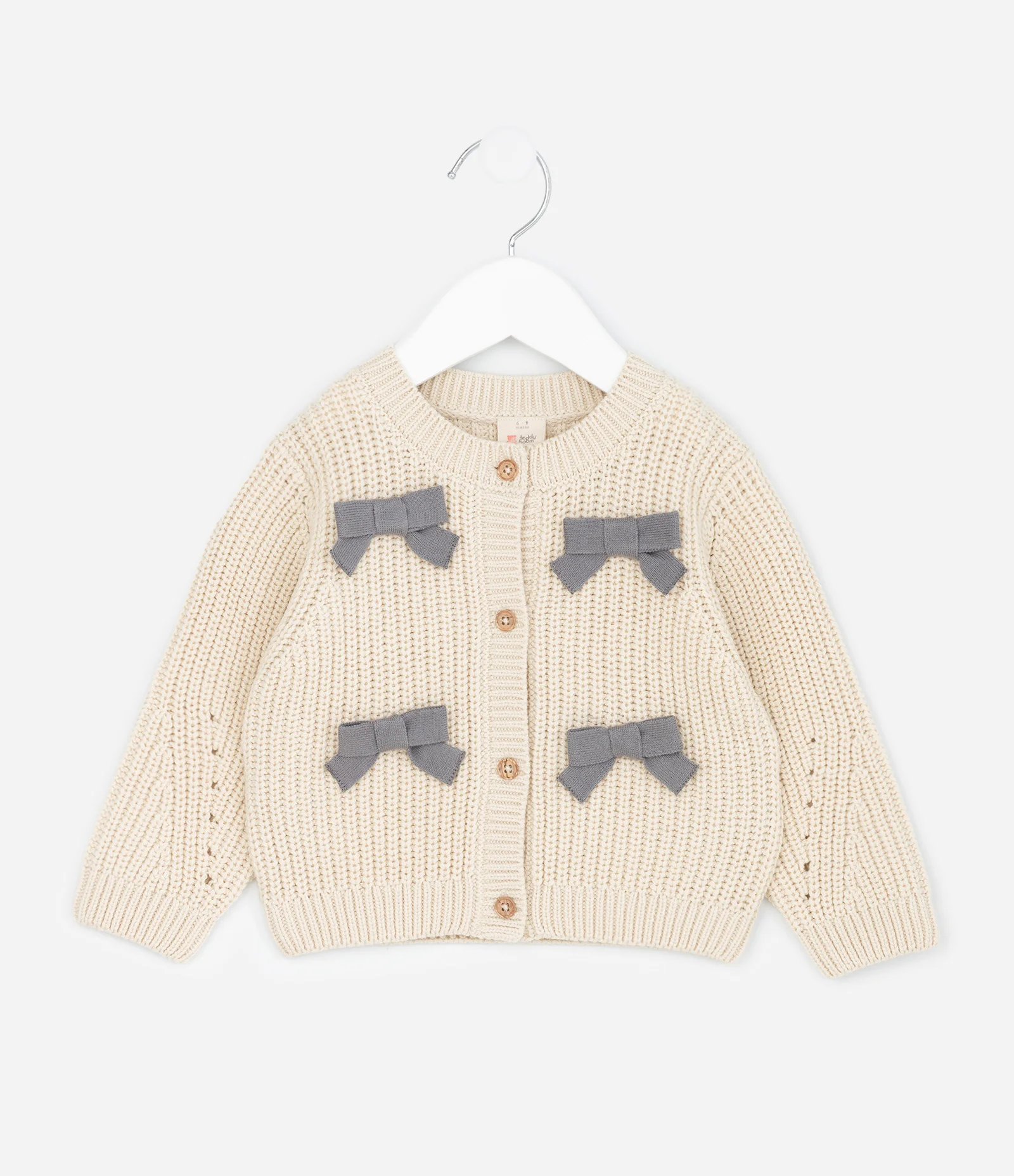 Cardigan Infantil em Tricô com Lacinhos Aplicados – Tam RN a 18 Meses Bege Claro 1