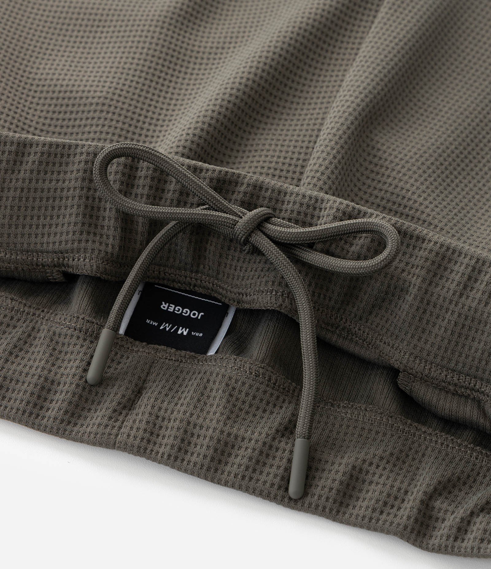 Calça Esportiva em Tecido Texturizado com Zíper nos Bolsos Verde Médio 8