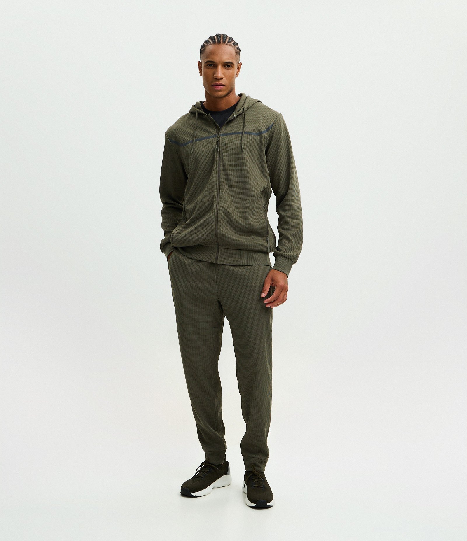 Calça Esportiva em Tecido Texturizado com Zíper nos Bolsos Verde Médio 1