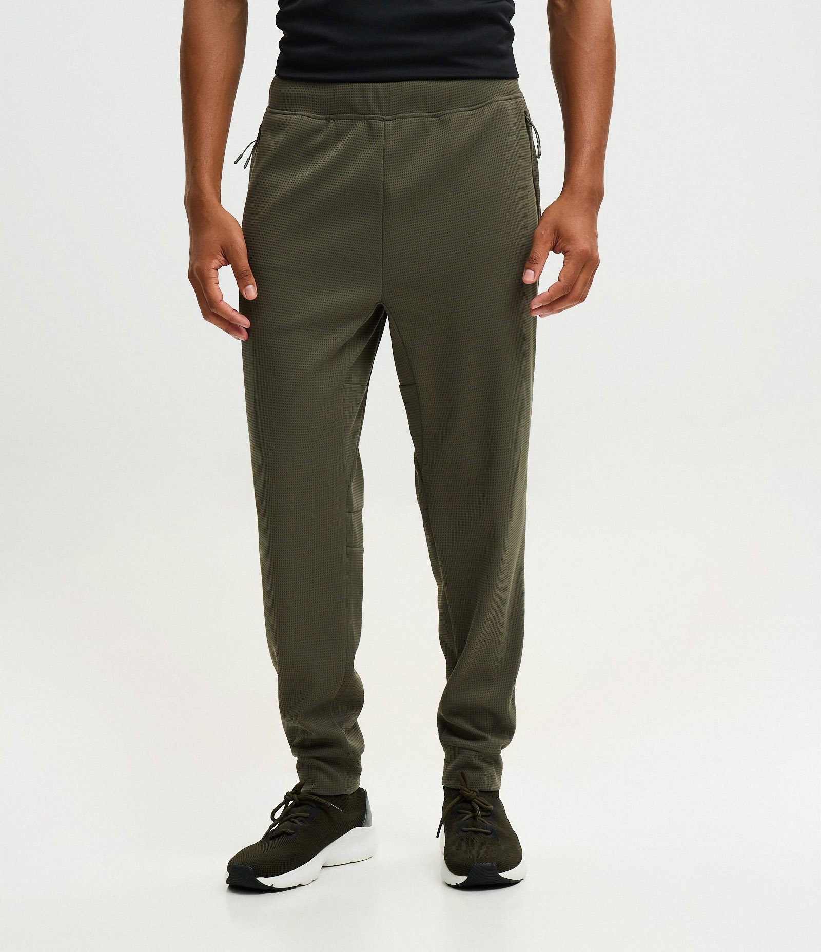 Calça Esportiva em Tecido Texturizado com Zíper nos Bolsos Verde Médio 2
