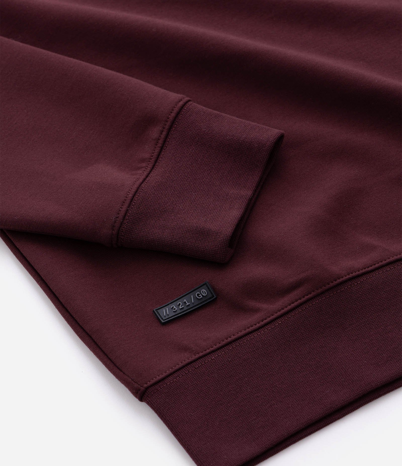 Casaco Fechado Esportivo com Punho Ajustado e Etiqueta Aplicada Bordô 9