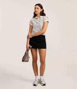 Minissaia em Jeans com Tachas nos Bolsos