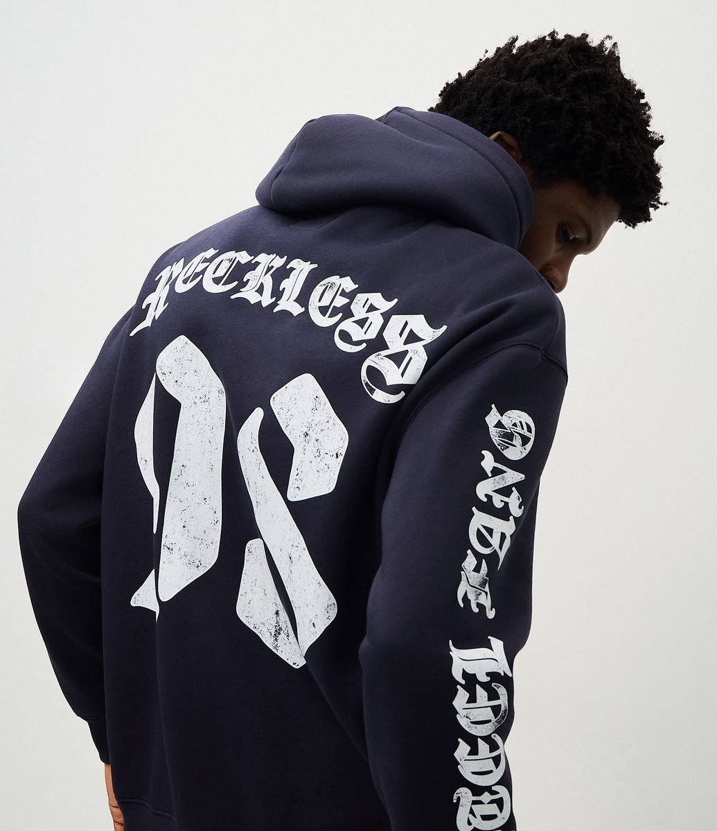 Casaco Relaxed em Moletom com Estampa Lettering Guepardo Reckless