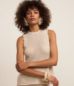 Blusa Peplum em Tricô com Cavas Onduladas