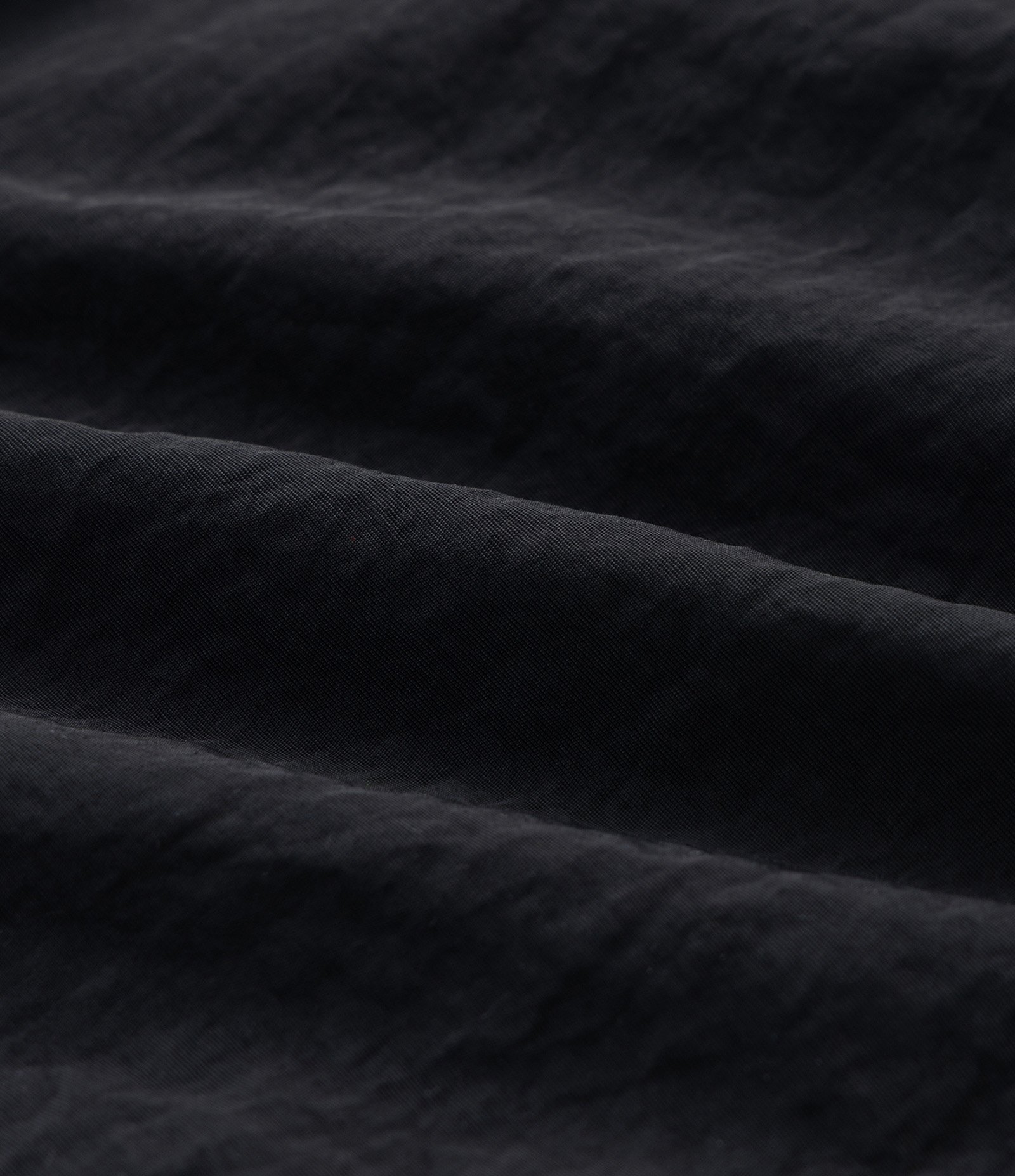 Bermuda Tecnológico Liso com Listras Contrastantes na Lateral Preto 3