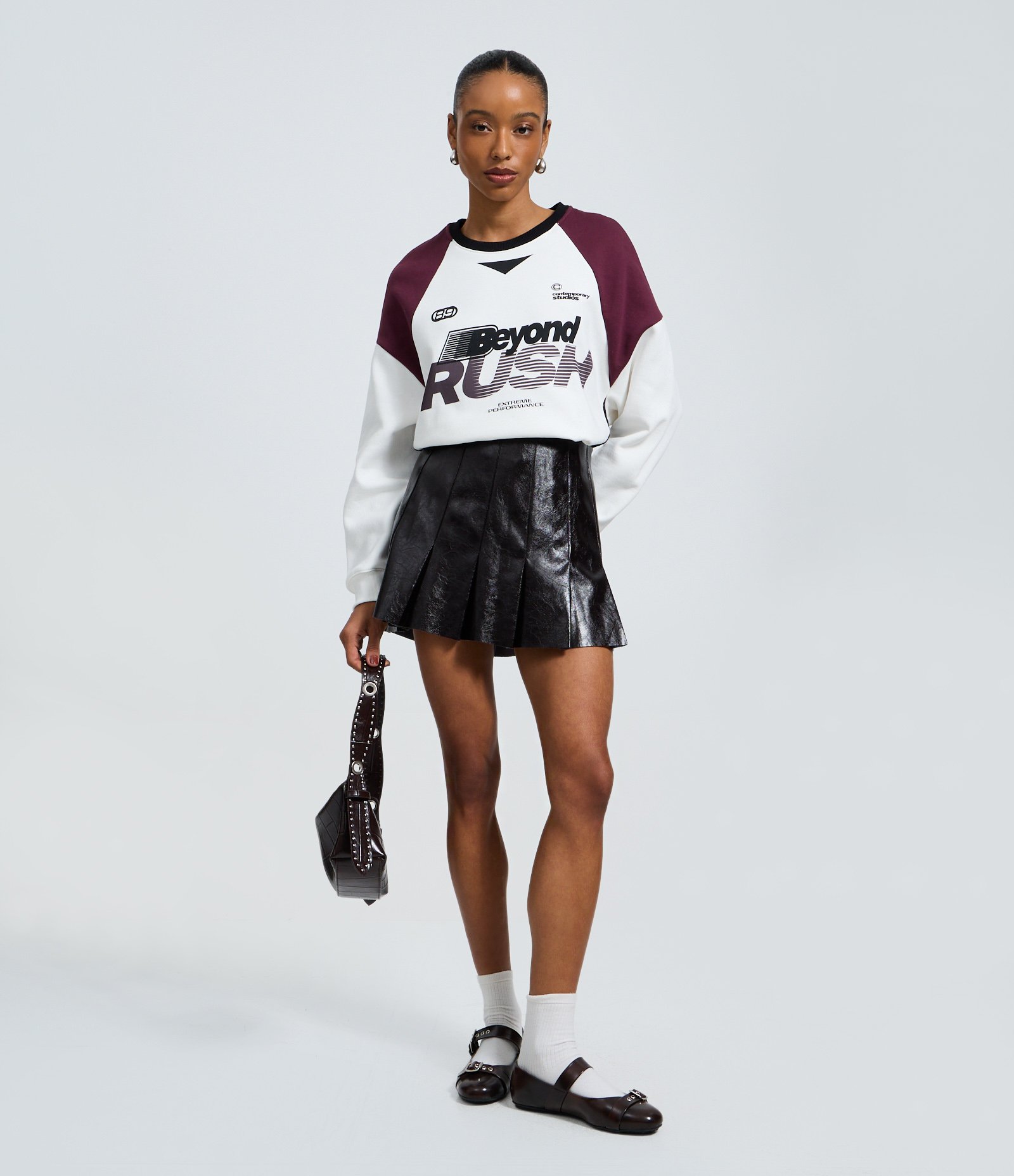 Saia Plissada em PU Vinil Preto 1