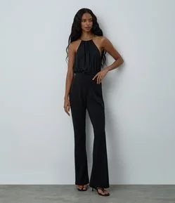 Calça Flare em Ponto Roma