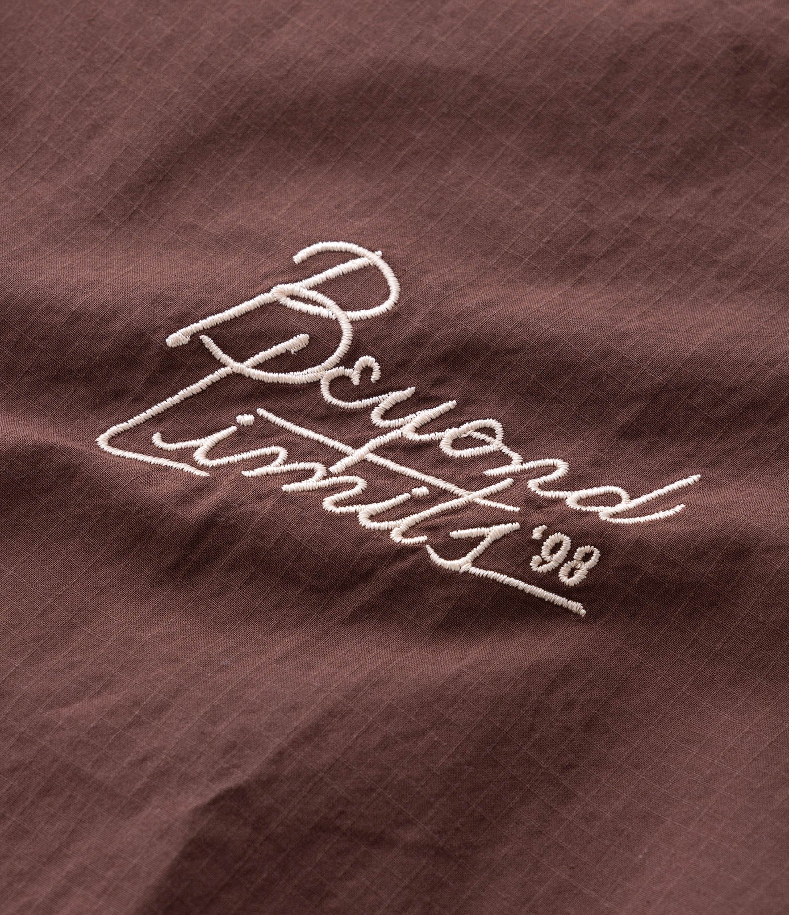 Camisa Boxy Manga Curta Texturizada com Lettering Bordado Marrom 8