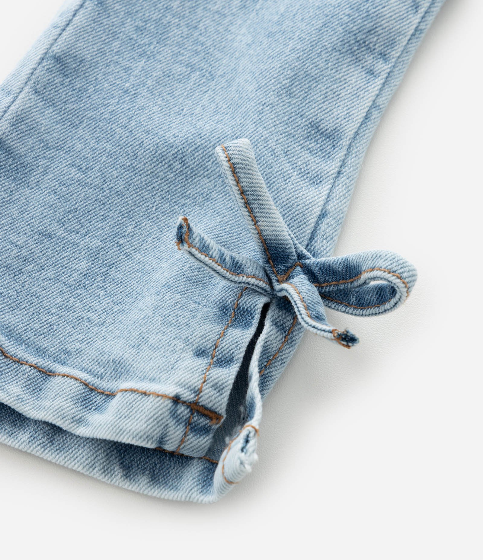 Calça Infantil em Jeans Flare com Lacinho na Barra – Tam 3 a 18 Meses Azul Claro 6