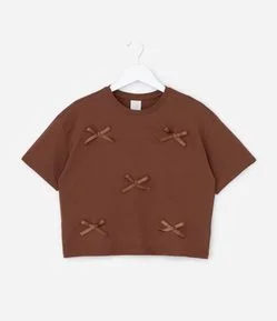 Camiseta Infantil Relaxed Boxy com Laços Aplicados – Tam 5 A 14 Anos