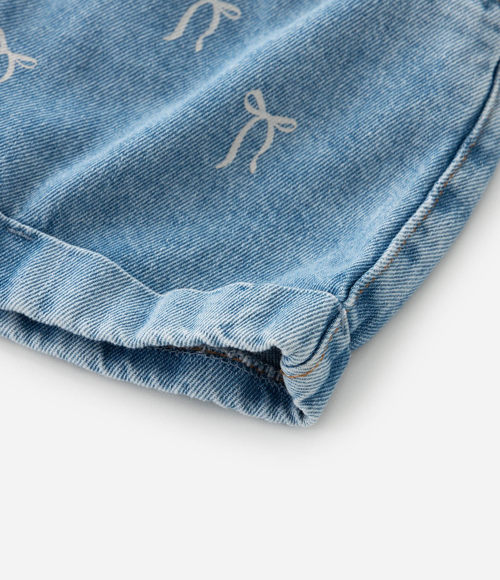 Short Infantil Clochard em Jeans com Estampa de Laços – Tam 5 a 14 Anos Azul 4