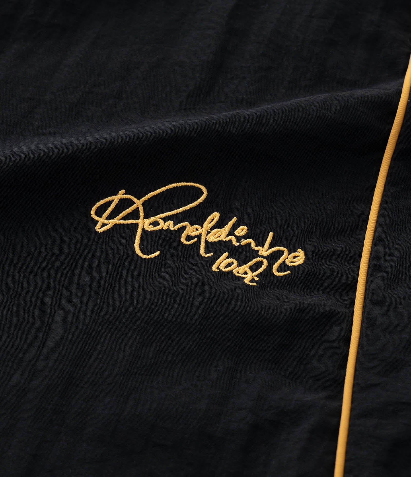 Calça em Microfibra Estampa Ronaldinho com Piping Contrastante Preto 9