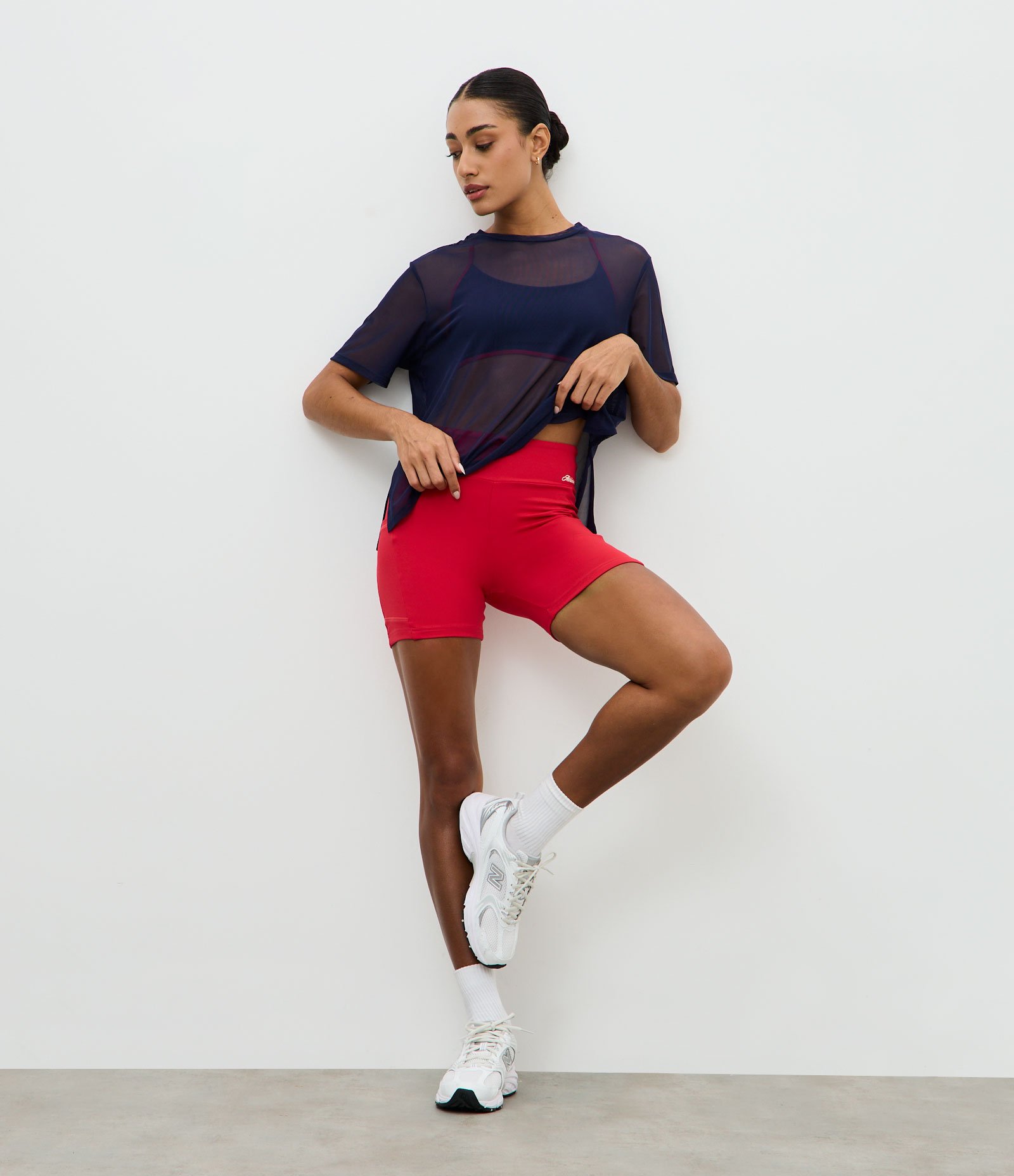Bermuda Esportiva em Microfibra com Bolso de Tule Laranja 1