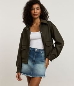 Minissaia Reta em Jeans Cintura Média com Barra Desfiada