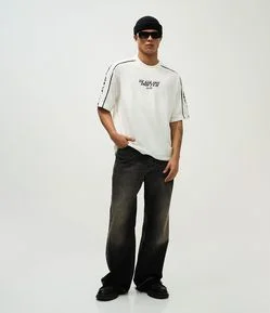 Calça Jeans Masculina Baggy Flare Preta com Barra Desfeita