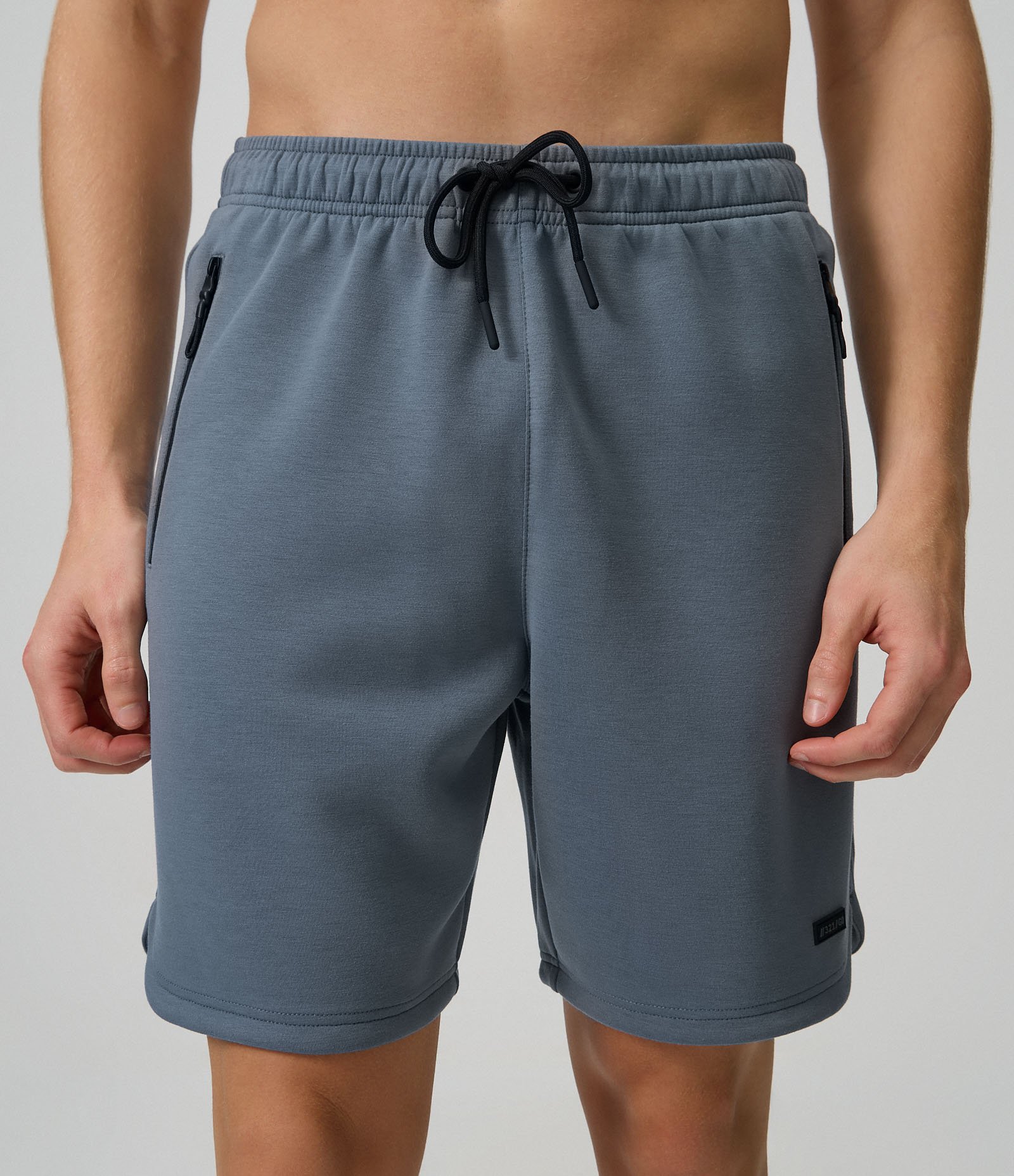 Bermuda Esportiva em Moletom Tecnológico com Cós Elástico e Zíper no Bolso Cinza 2