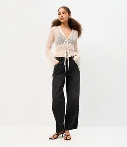 Calça Baggy em Jeans com Cintura Média e Ajuste