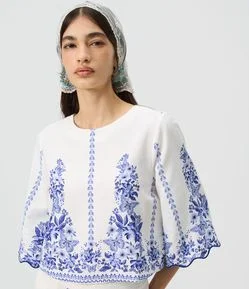 Blusa em Viscolinho com Manga Ampla e Barra Ondulada