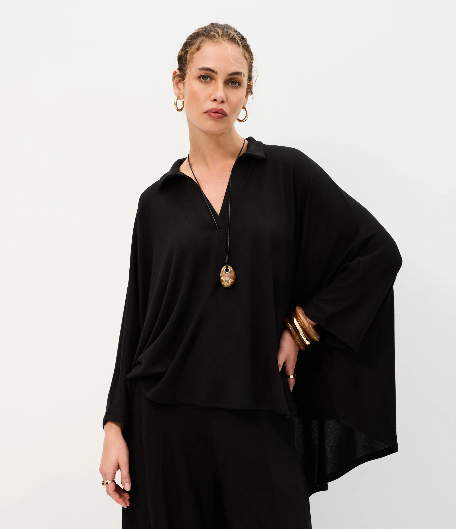 Blusa em Tricô com Gola Polo e Mangas Amplas Preto 1