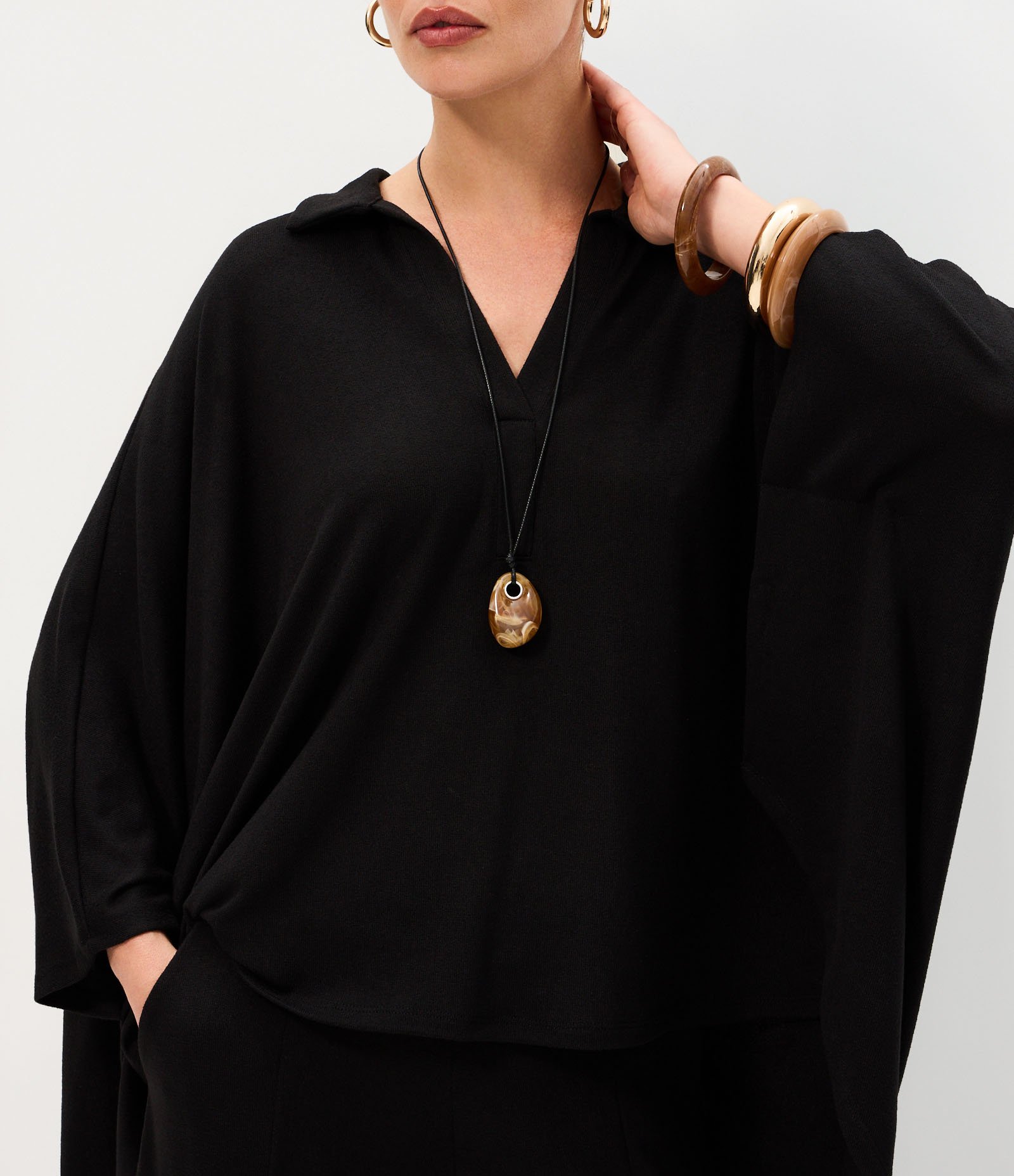 Blusa em Tricô com Gola Polo e Mangas Amplas Preto 4